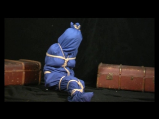 alex tied in blue bag